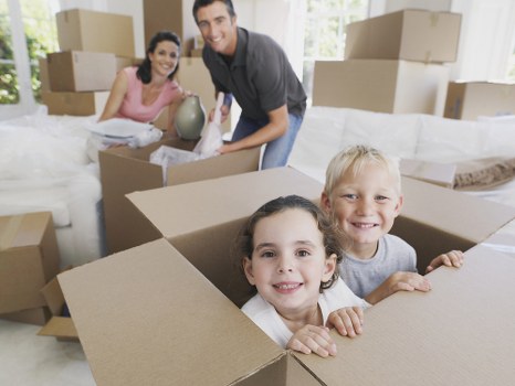 Local office removals planning in Enfield with desks and packed boxes