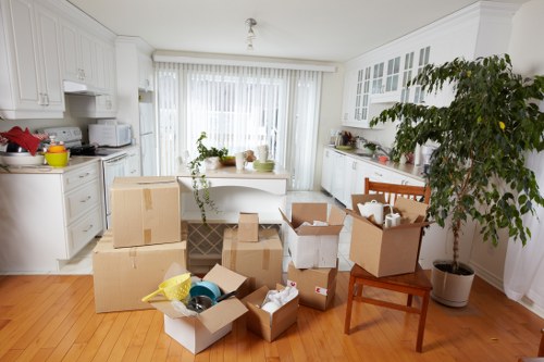 Packed boxes and furniture ready for local storage