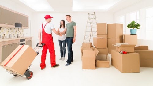 Boxes and furniture ready for a student move across Enfield