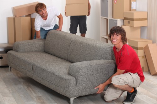 Household items being arranged for a cubic-yard estimate