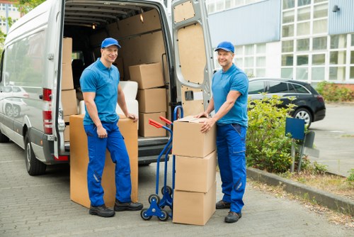 Carefully secured boxes and furniture inside a moving van