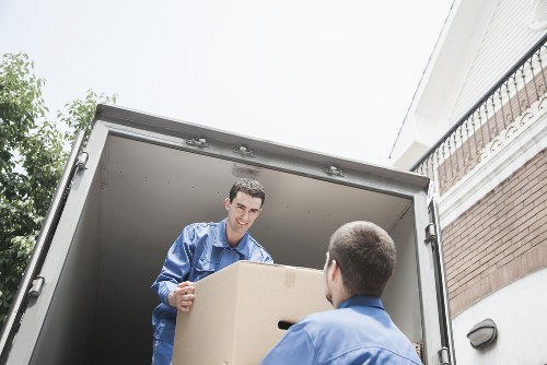 Loading household furniture into a removal van
