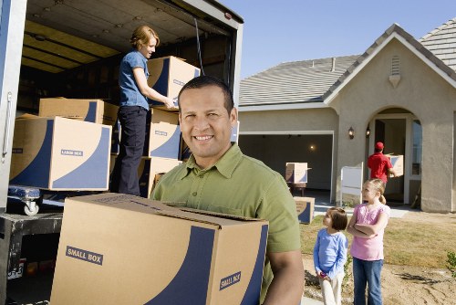 Enfield man with van staff using training to handle items safely